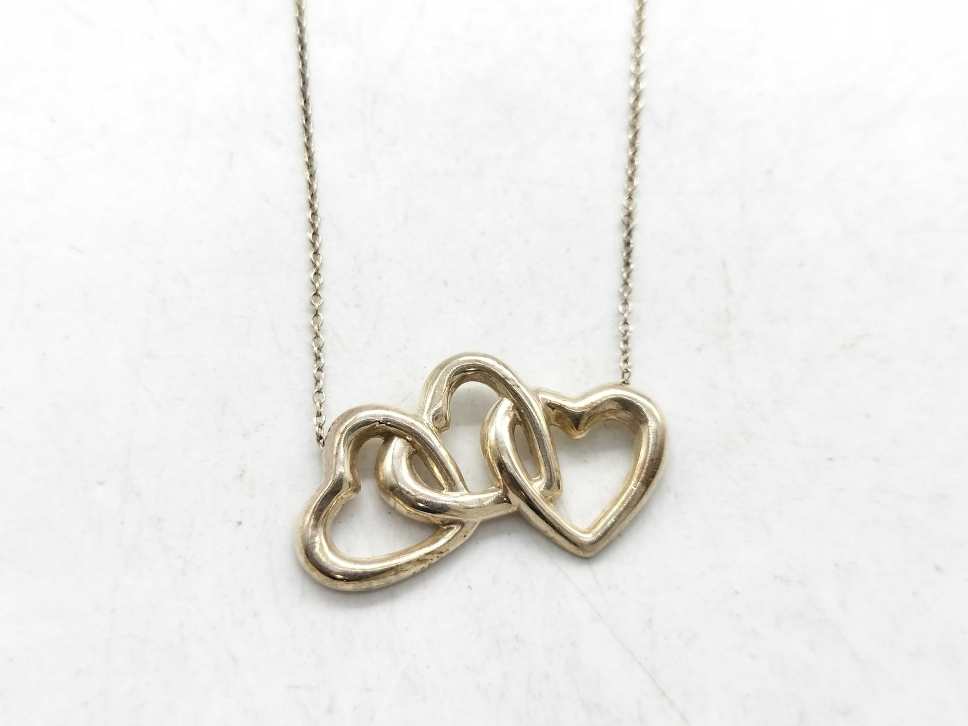 Tiffany & Co. Tiffany Triple Heart Necklace