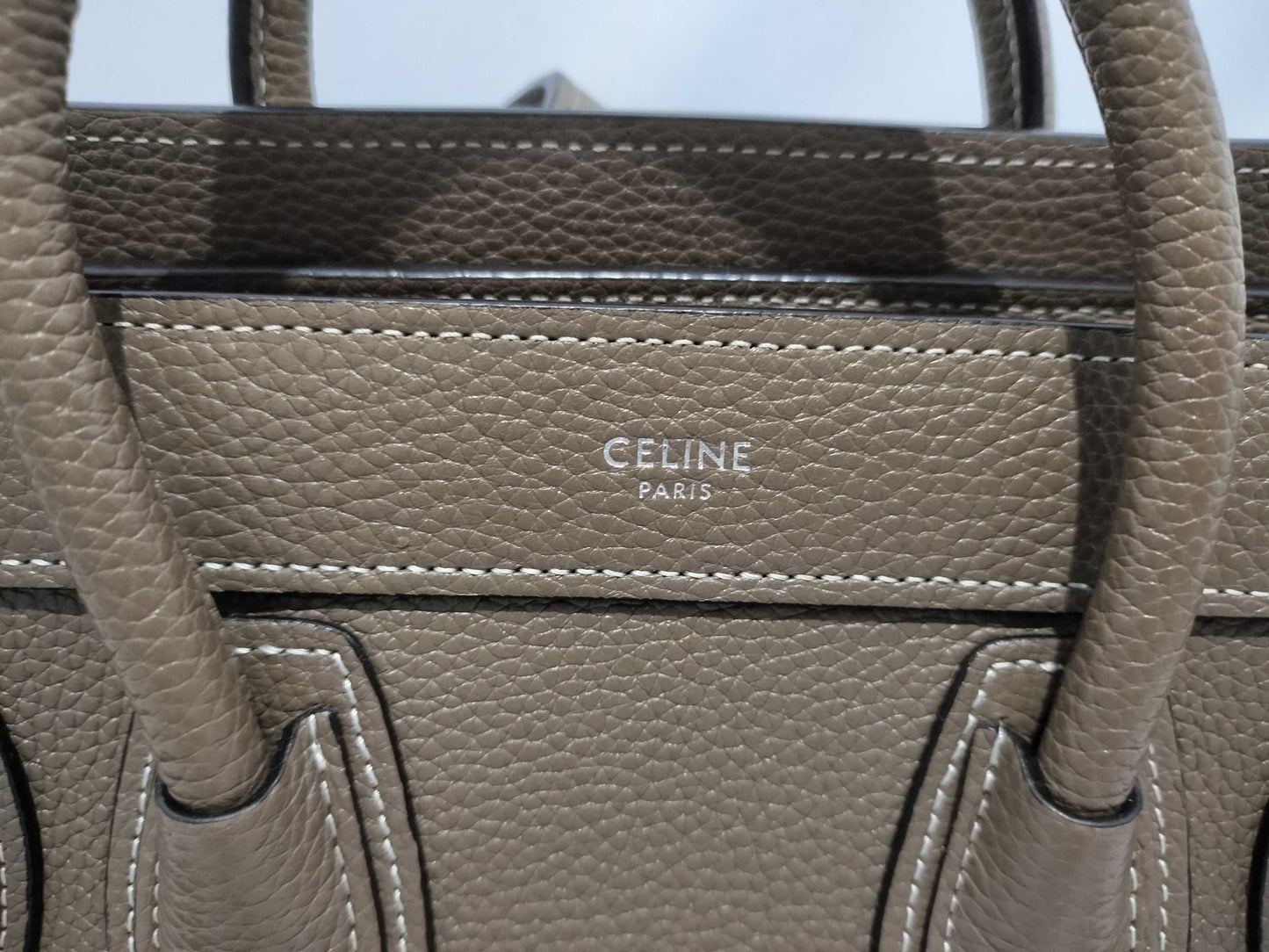 CELINE Drummed Calfskin Fragrance Nano Shopper Leather 2-Way Handbag in Greige with Silver Hardware and Dust Bag. Includes Shoulder Strap.
