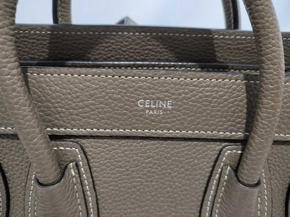 CELINE Drummed Calfskin Fragrance Nano Shopper Leather 2-Way Handbag in Greige with Silver Hardware and Dust Bag. Includes Shoulder Strap.