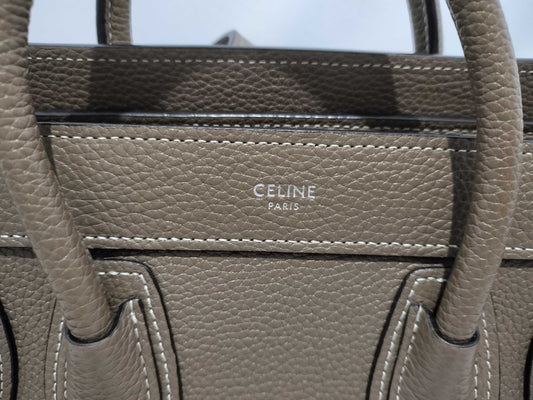 CELINE Drummed Calfskin Fragrance Nano Shopper Leather 2-Way Handbag in Greige with Silver Hardware and Dust Bag. Includes Shoulder Strap.