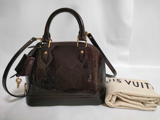 LOUIS VUITTON Vernis Amarante Alma Handbag