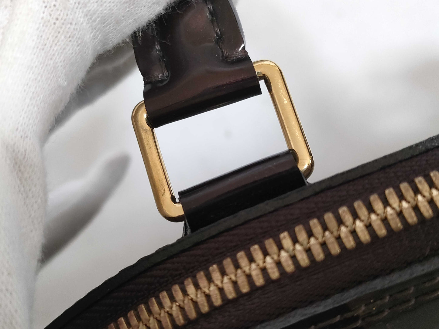 LOUIS VUITTON Vernis Amarante Alma Handbag