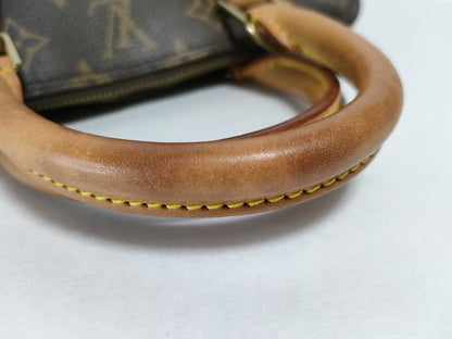 LOUIS VUITTON Monogram Alma Handbag