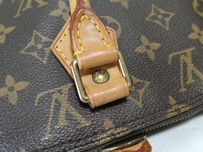 LOUIS VUITTON Monogram Alma Handbag