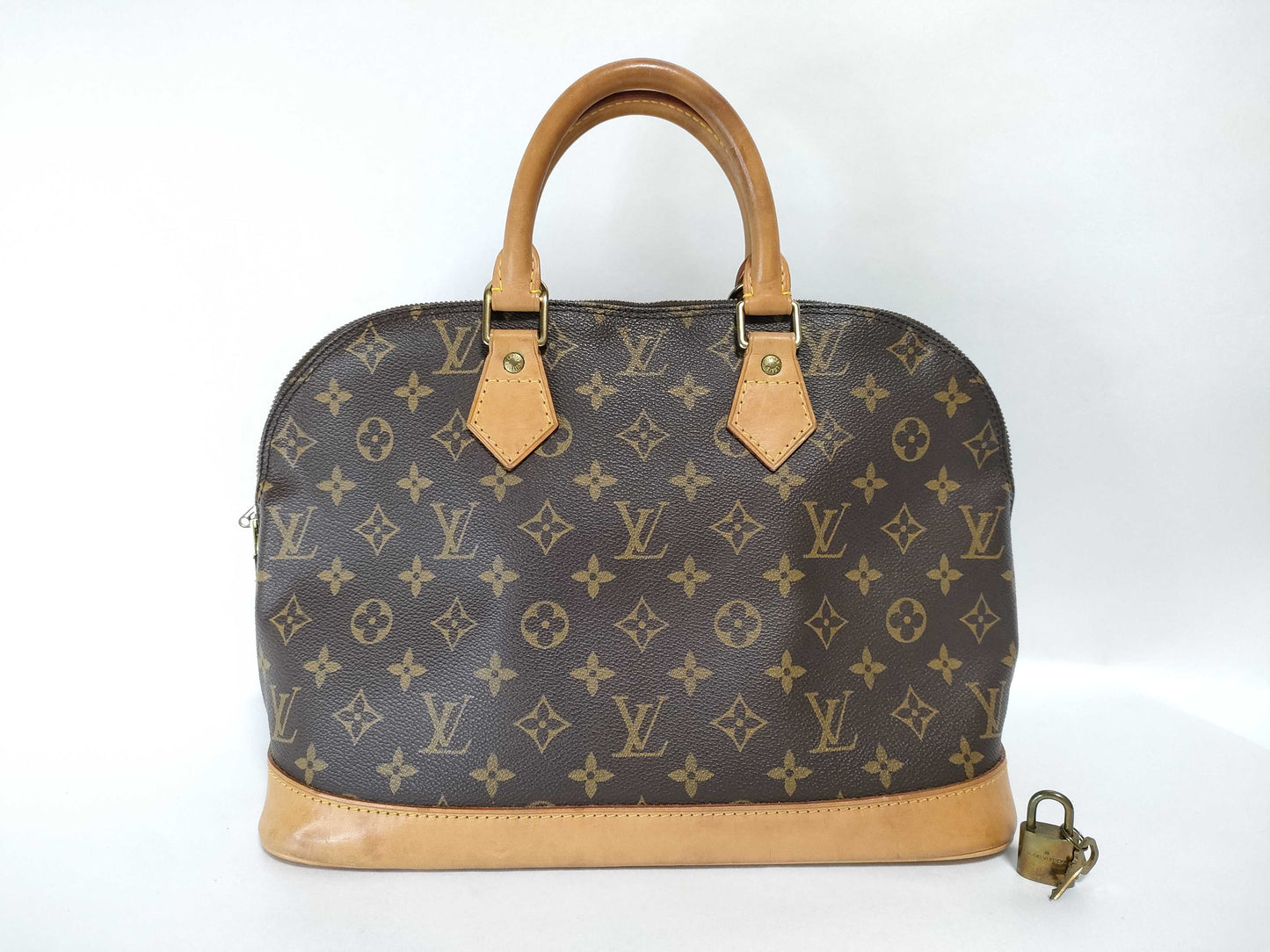 LOUIS VUITTON Monogram Alma Handbag
