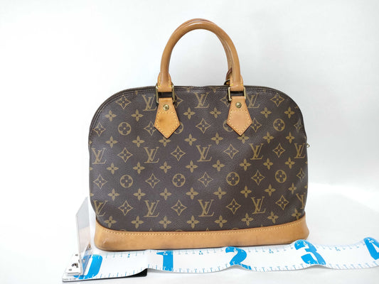 LOUIS VUITTON Monogram Alma Handbag