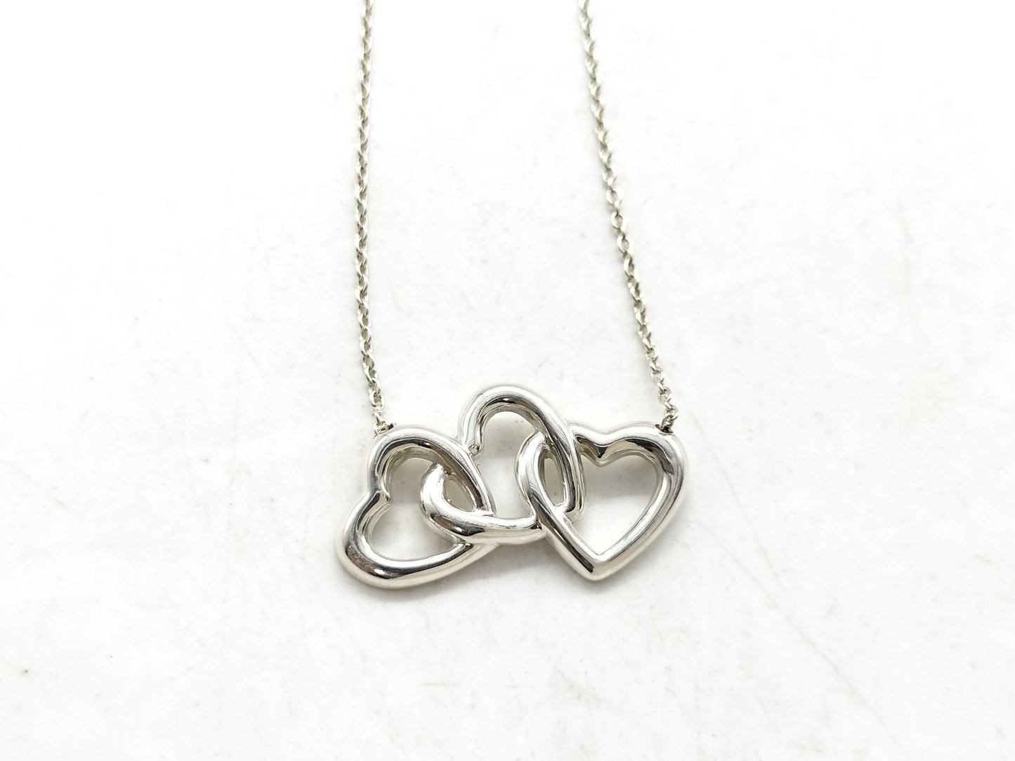 Tiffany & Co. Tiffany Triple Heart Necklace