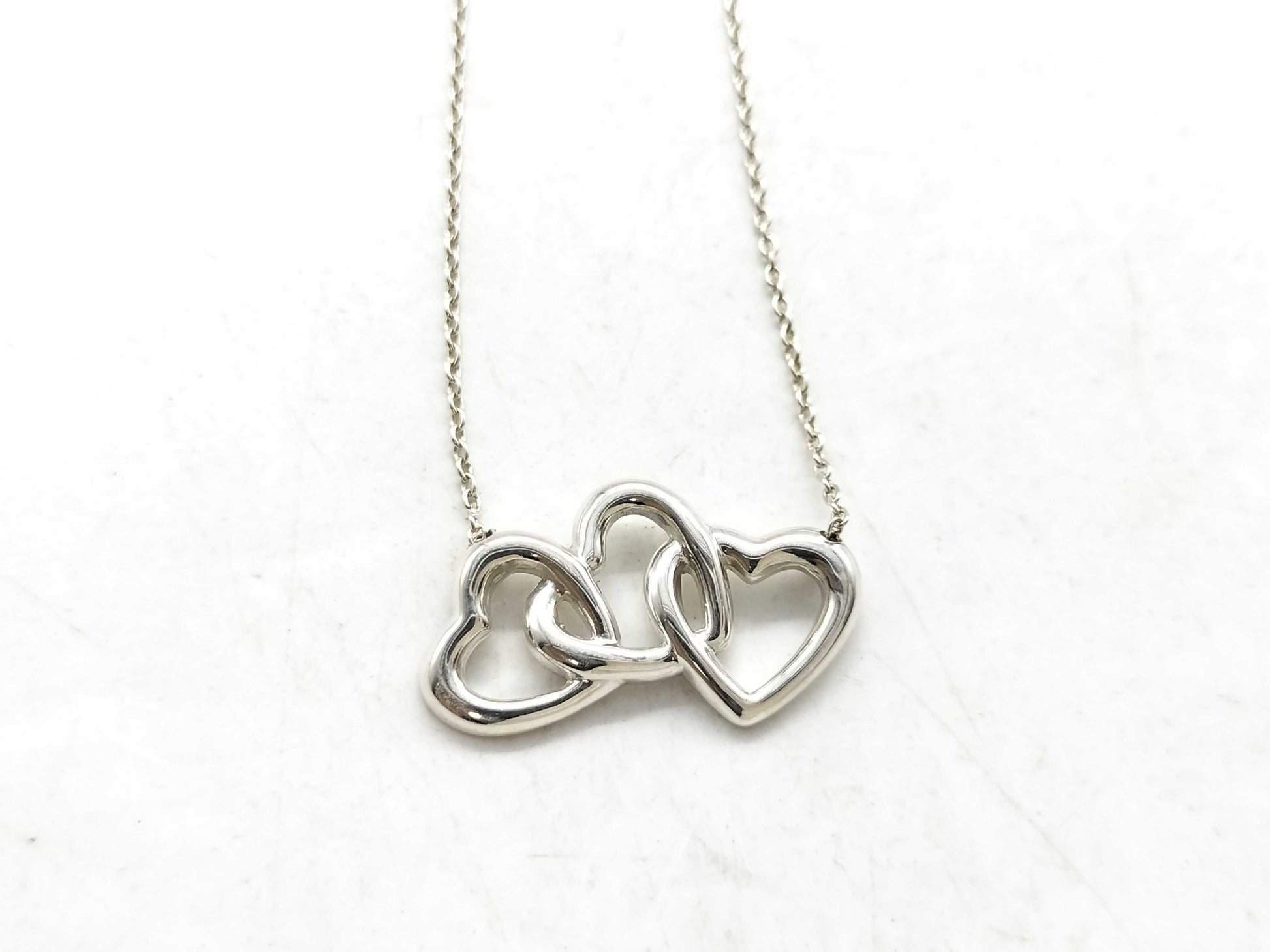 Tiffany & Co. Tiffany Triple Heart Necklace