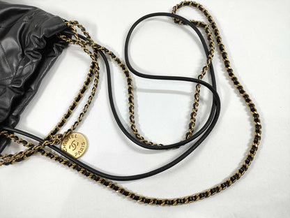 CHANEL CHANEL 22 Shiny Calfskin Chain Shoulder Bag with Gold Hardware and Serial Number Plate in Black