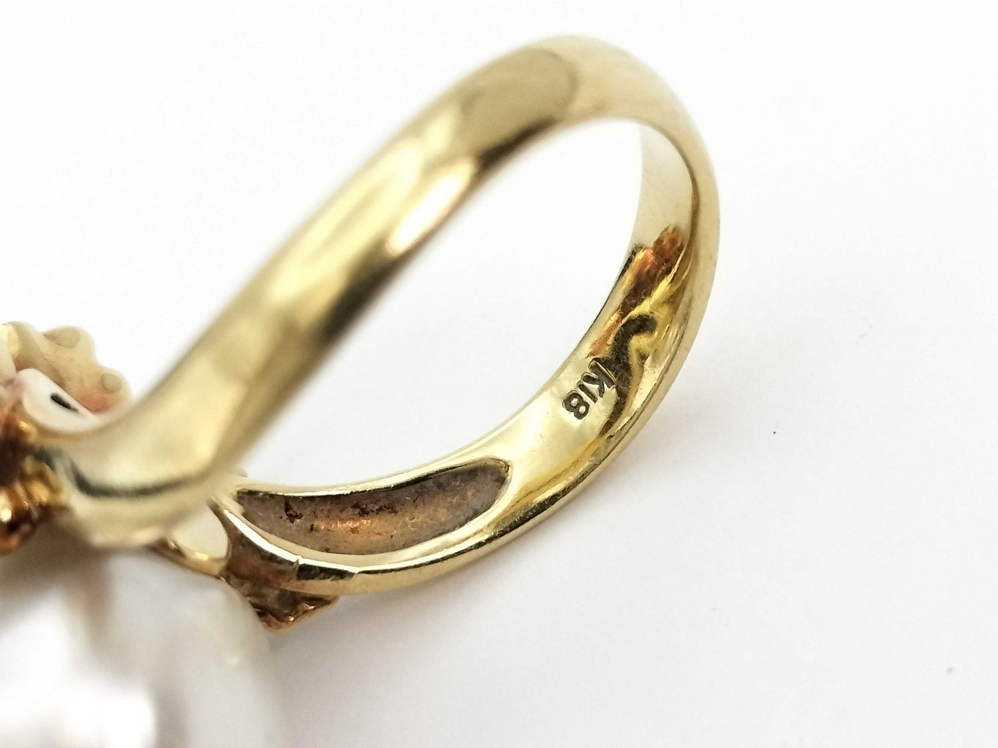 Semi-round pearl, diameter approx. 11.9mm, D0.10ct, 18K gold, 9.5g, ring 