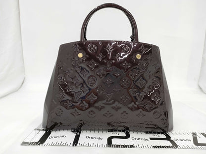 LOUIS VUITTON Louis Vuitton Verni Montaigne MM Handbag