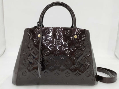 LOUIS VUITTON Louis Vuitton Verni Montaigne MM Handbag