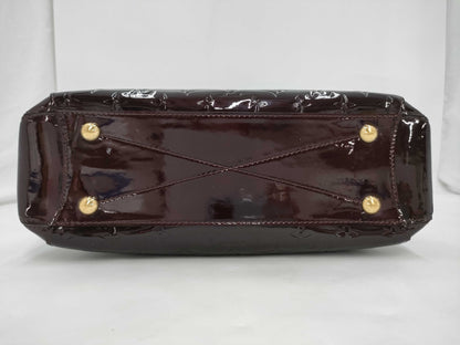 LOUIS VUITTON Louis Vuitton Verni Montaigne MM Handbag