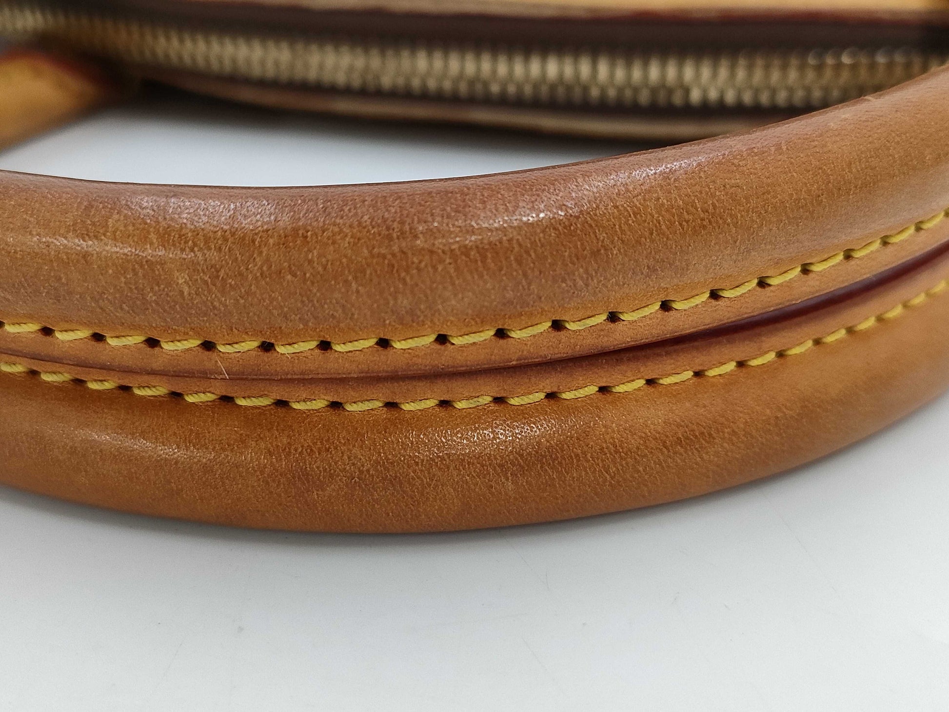 LOUIS VUITTON Tivoli PM Monogram Handbag