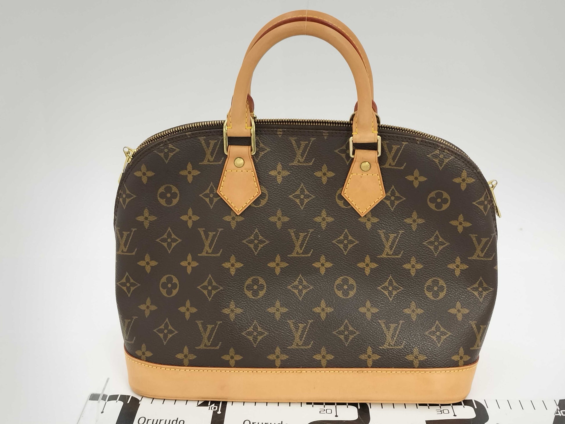 LOUIS VUITTON Monogram ALMA Handbag