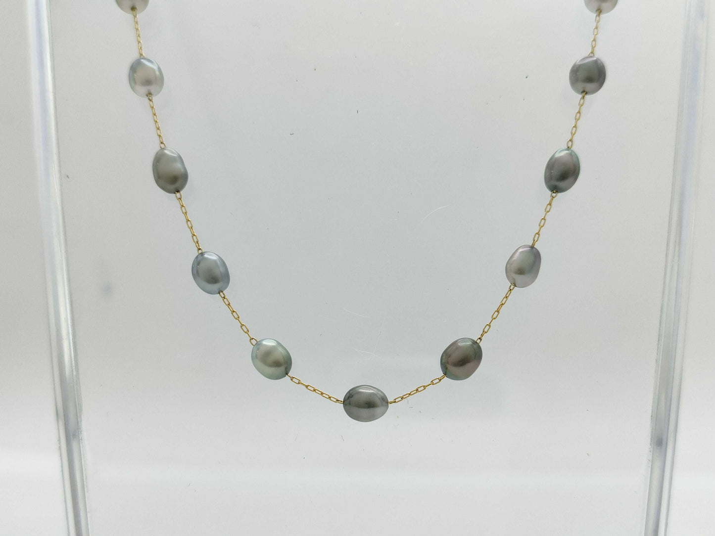Semi-round pearl necklace, diameter approximately 4.0-4.7mm, 14K gold, 5.2g 