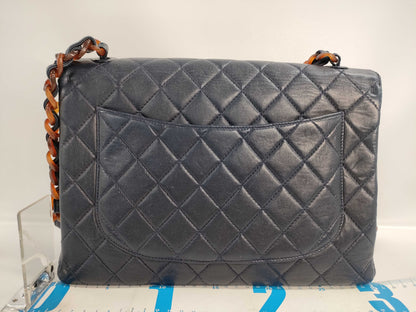 CHANEL Matelasse Plastic Chain Shoulder Bag in Navy