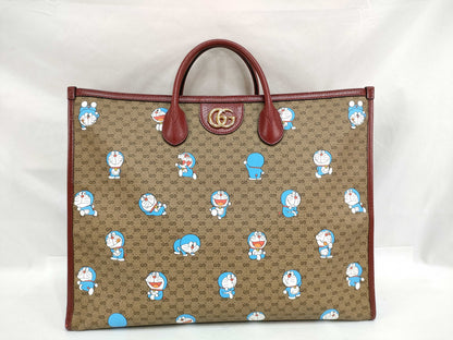GUCCI GG Supreme Gucci 653952 Doraemon Mini GG Supreme Tote Bag