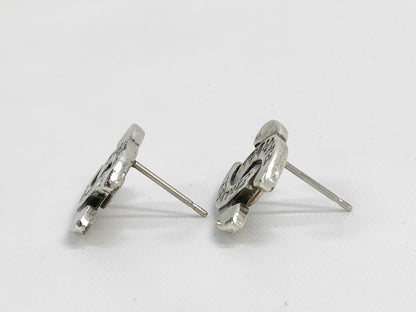 CHANEL Coco Mark earrings with parts and comments
