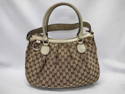 GUCCI Gucci Gold Leather Trim Monogram Tofu Handbag Handbag