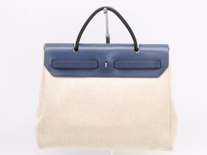 HERMES Leather Air Bag PM Shoulder Bag with Shoulder Strap, Padlock, 2 Keys, Cloche, and Dust Bag. Navy and White.