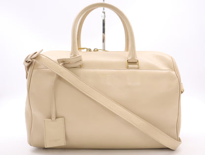 SAINT LAURENT Leather Classic Duffle 6 2-way Handbag/Shoulder Bag in Beige with GD Hardware and Clochet closure
