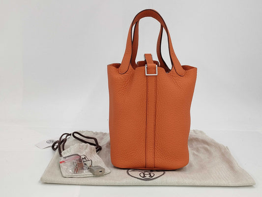 HERMES Picotin Lock PM Handbag, Orange Minian, Taurillon Clemence Leather, W Stamped, Handbag