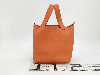 HERMES Picotin Lock PM Handbag, Orange Minian, Taurillon Clemence Leather, W Stamped, Handbag