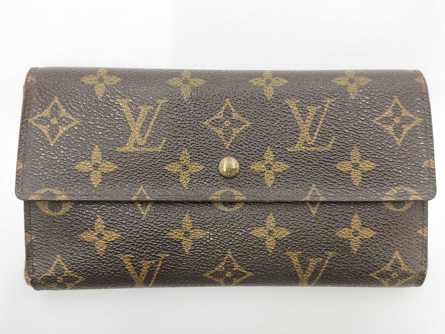 LOUIS VUITTON M Monogram Porte Tresor International Tri-fold Long Wallet