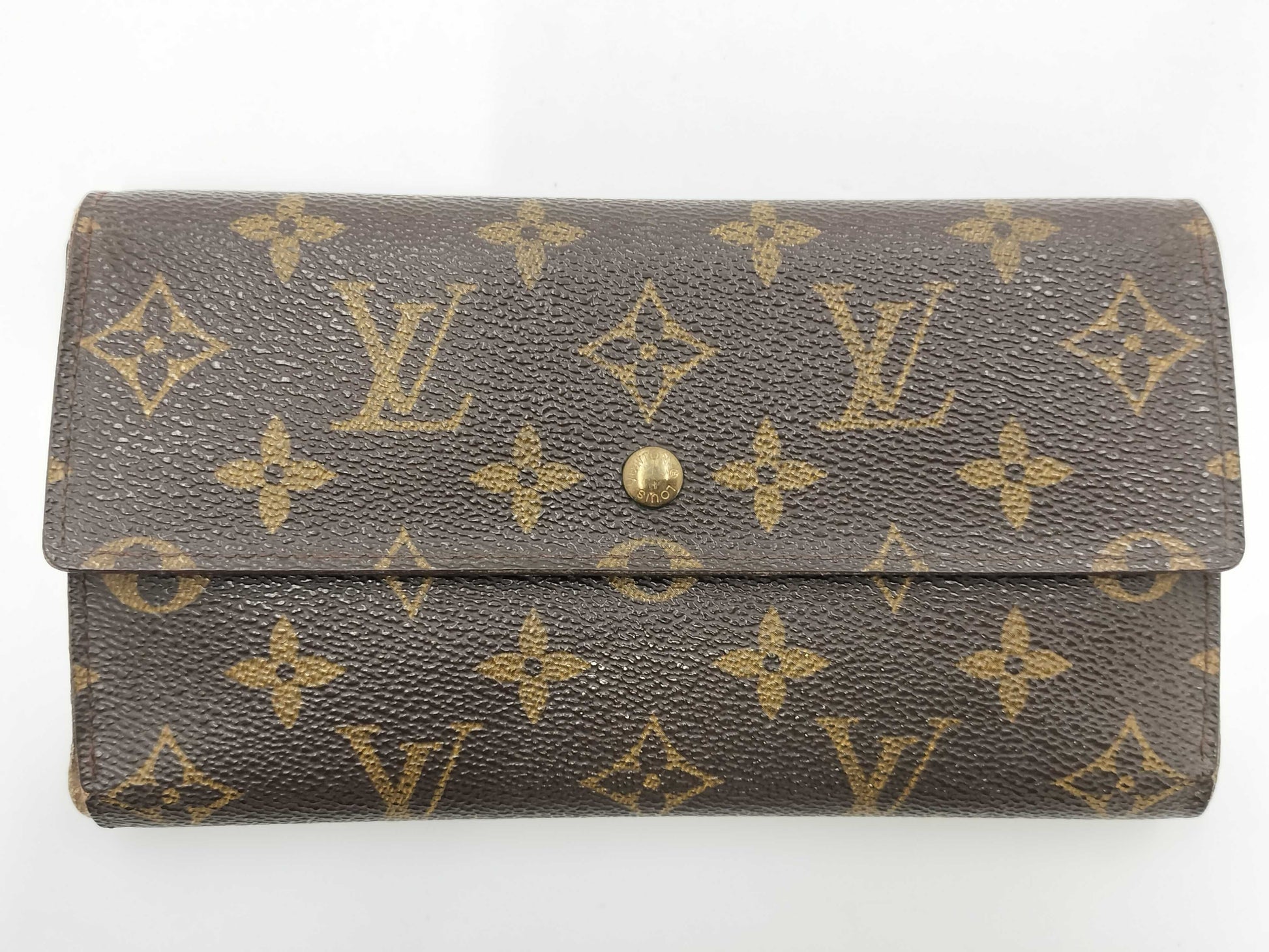 LOUIS VUITTON M Monogram Porte Tresor International Tri-fold Long Wallet