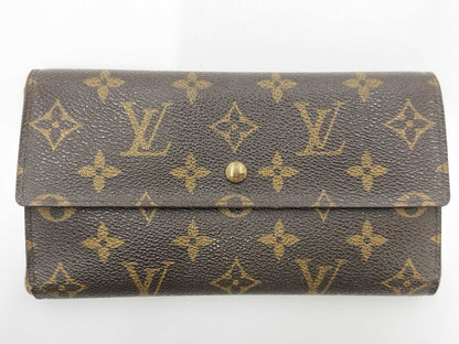 LOUIS VUITTON M Monogram Porte Tresor International Tri-fold Long Wallet
