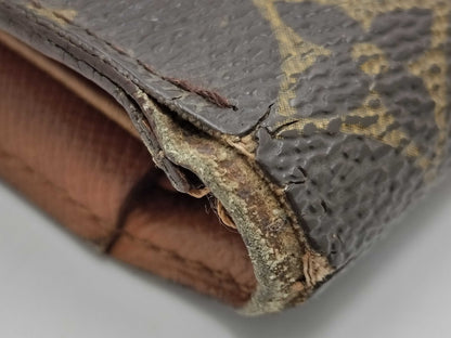 LOUIS VUITTON M Monogram Porte Tresor International Tri-fold Long Wallet