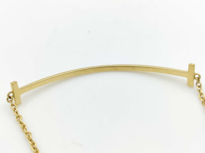 Tiffany & Co. T Smile Diamond Bracelet/Bangle in Yellow Gold and AU750, 2.6g 