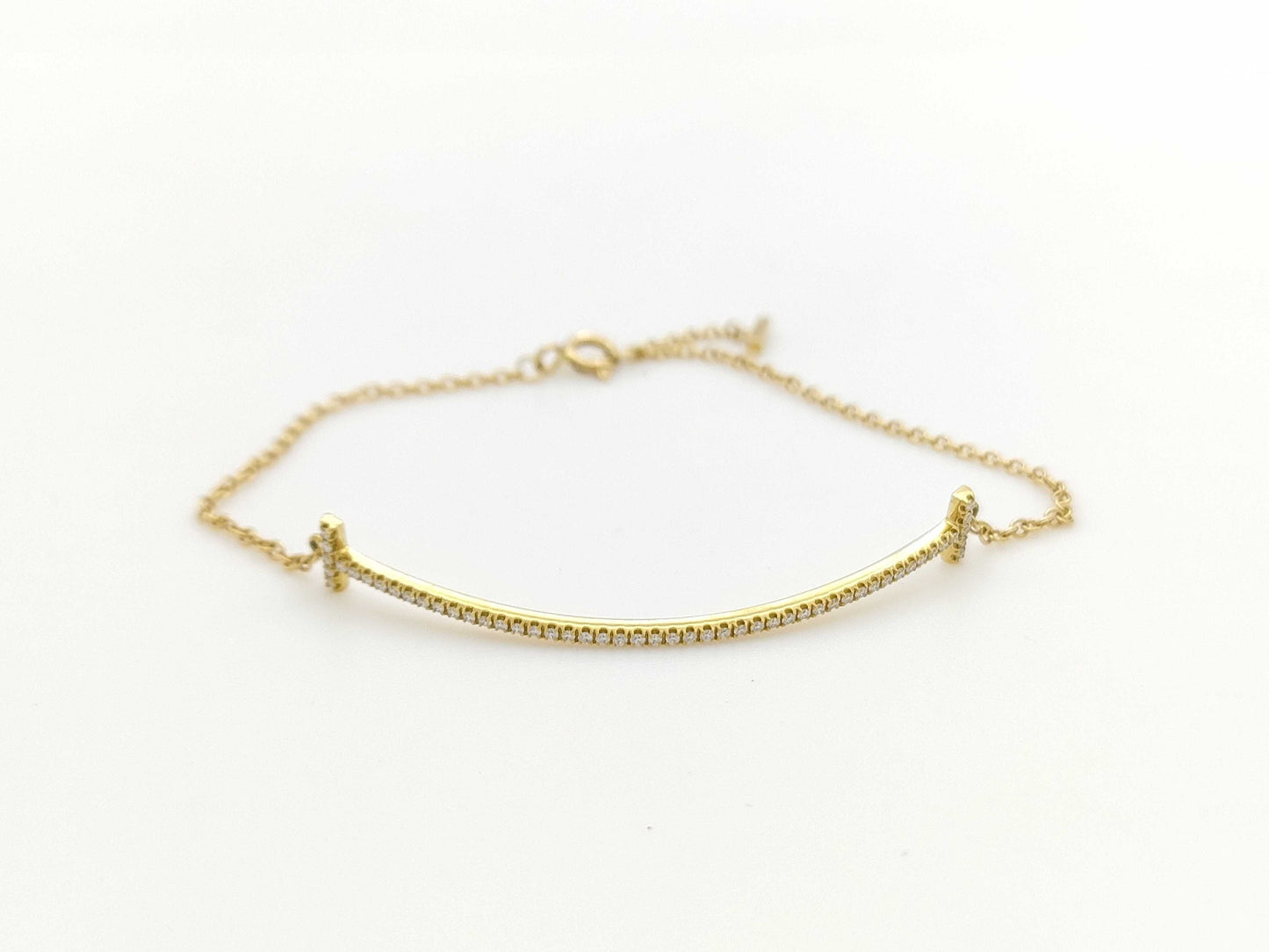 Tiffany & Co. T Smile Diamond Bracelet/Bangle in Yellow Gold and AU750, 2.6g 