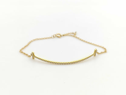 Tiffany & Co. T Smile Diamond Bracelet/Bangle in Yellow Gold and AU750, 2.6g 