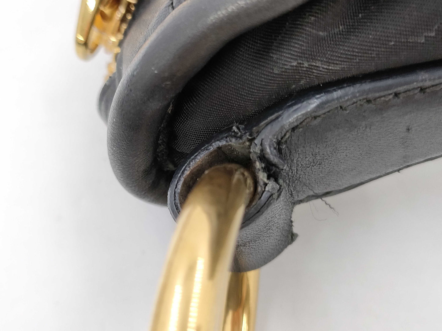 PRADA Tessuto nylon and leather one-shoulder bag with name tag