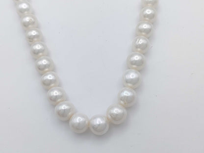 Semi-round pearl necklace, diameter approximately 9.4-10.5mm, sterling silver, 64.0g .