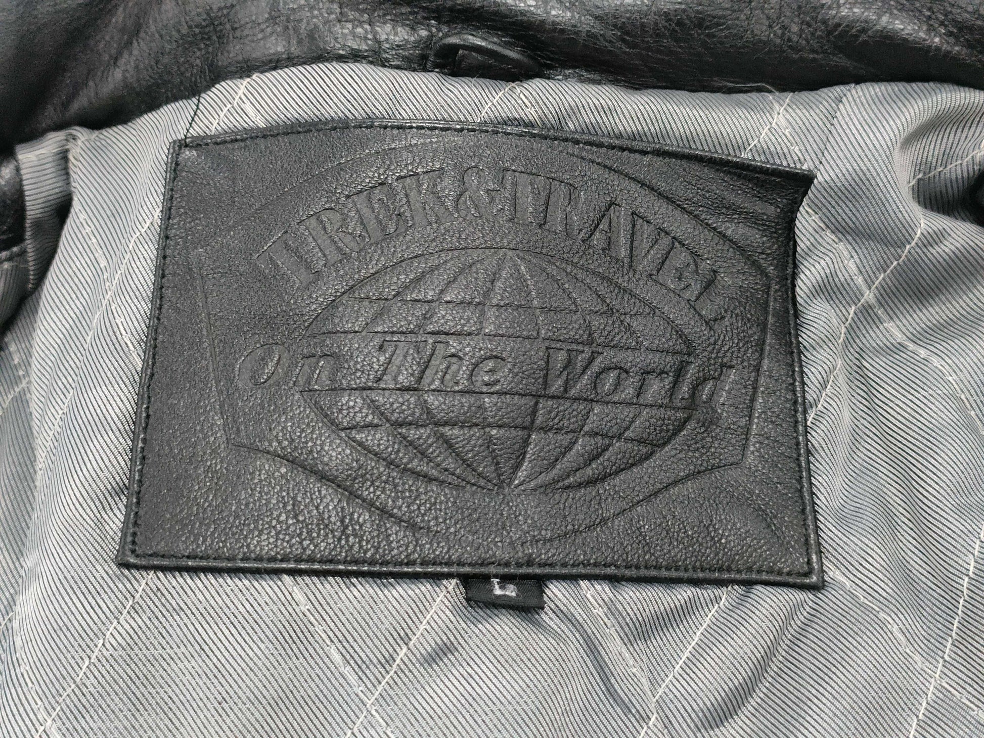 on the world cowhide coat, size L, long coat