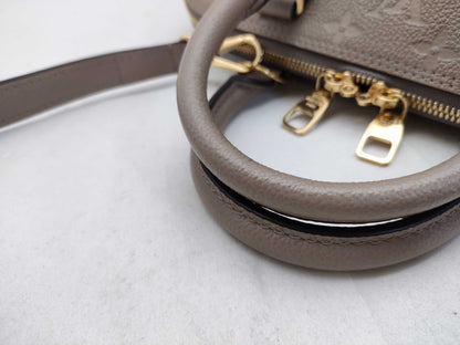 LOUIS VUITTON Monogram Empreinte Louis Vuitton Neo Alma Empreinte Handbag