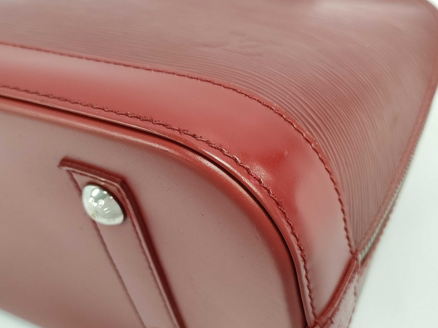 LOUIS VUITTON Epi Alma Handbag