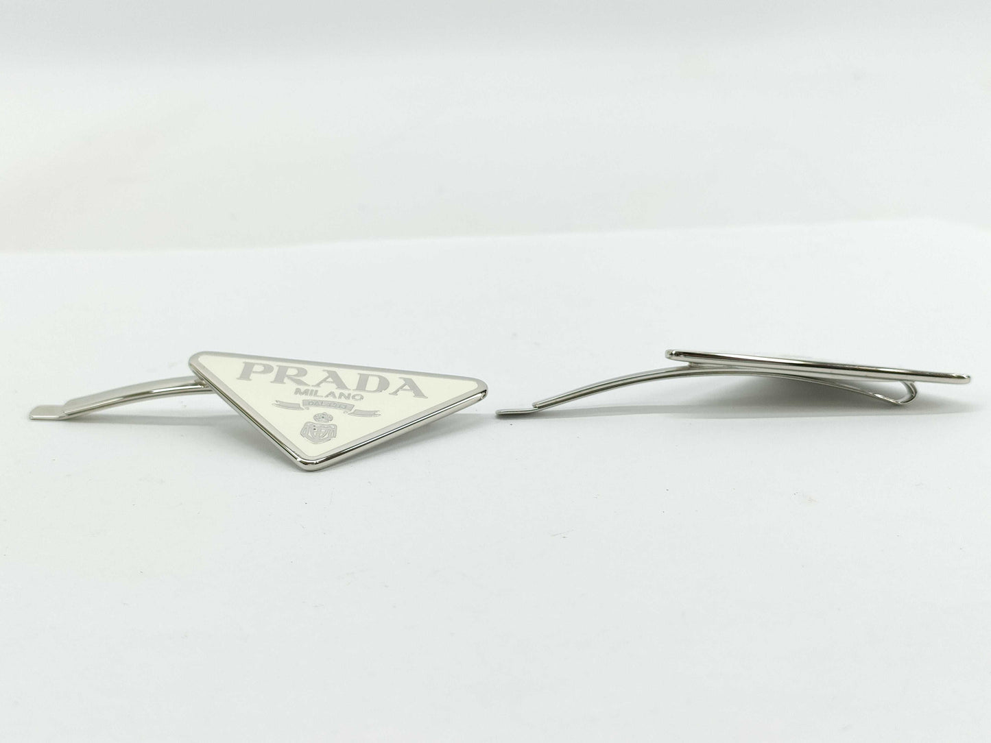 PRADA Prada Logo Hairpin. Accessories: Box, Dust Bag. Hair Accessory.