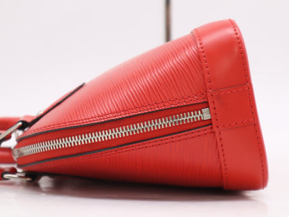 LOUIS VUITTON M41160 Epi Alma BB Coquelicot Handbag with Shoulder Strap, Cloche, Cadena, and Two Keys