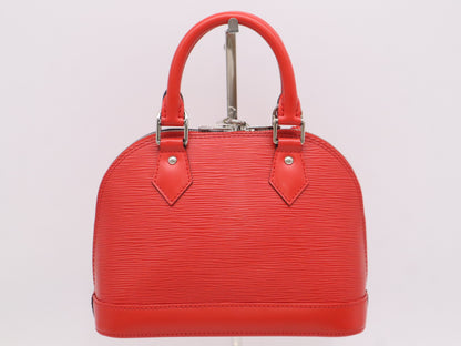 LOUIS VUITTON M41160 Epi Alma BB Coquelicot Handbag with Shoulder Strap, Cloche, Cadena, and Two Keys