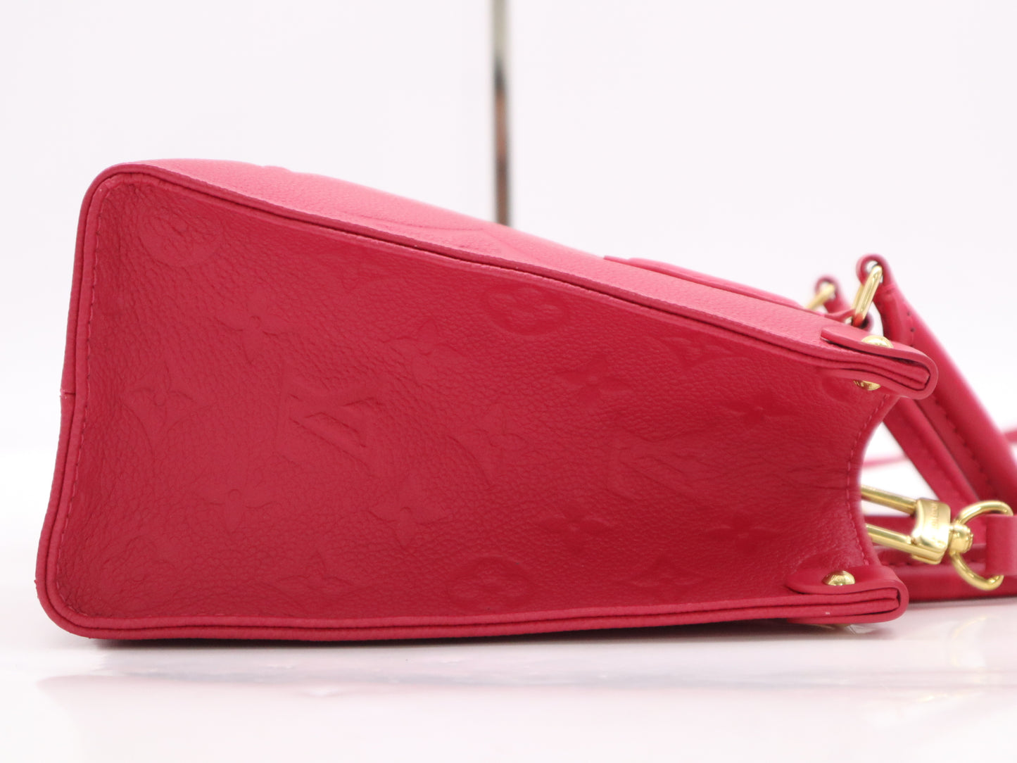 LOUIS VUITTON Monogram Empreinte M45660 Monogram Empreinte Empreinte On-the-Go PM Freesia Handbag with Shoulder Strap, RFID Verified