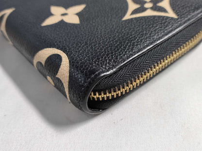 LOUIS VUITTON Monogram Empreinte Zippy Wallet in Black and Beige with IC Tag and G Hardware