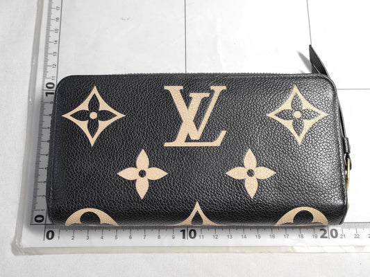 LOUIS VUITTON Monogram Empreinte Zippy Wallet in Black and Beige with IC Tag and G Hardware