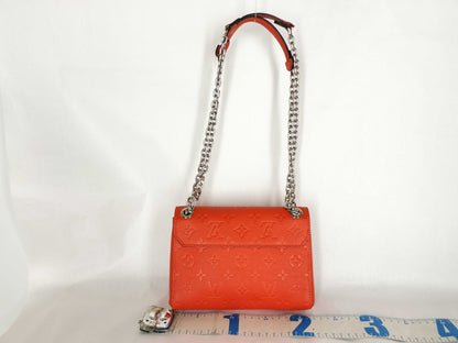 LOUIS VUITTON Monogram Empreinte LOUIS VUITTON Vavin BB Empreinte/Tonic Orange Shoulder Bag