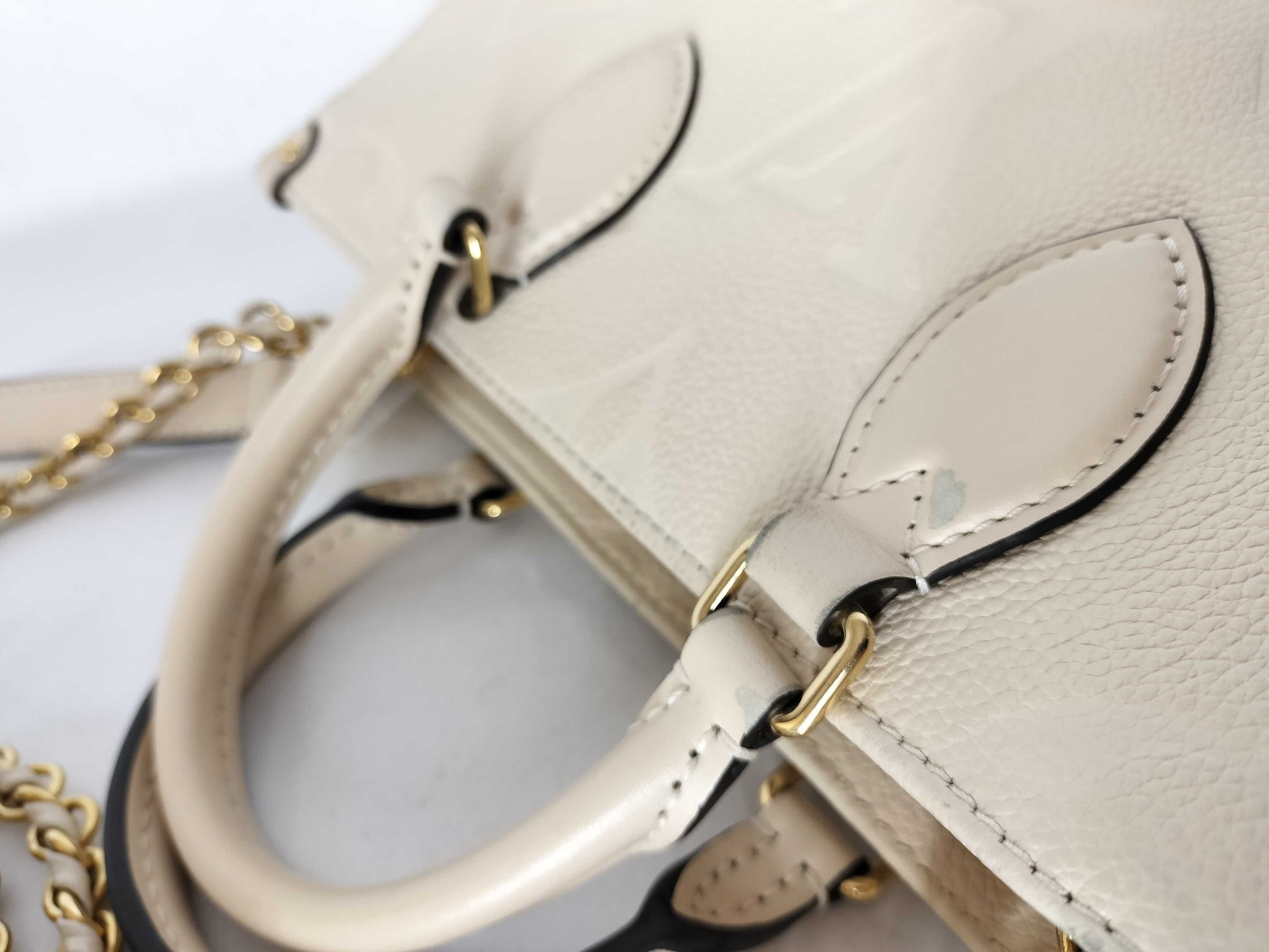 LOUIS VUITTON Monogram Empreinte On-the-Go EW IC Shoulder Bag