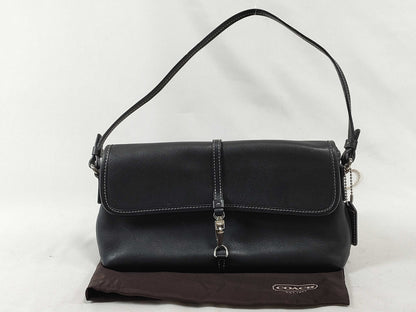 COACH Black Leather Handbag with Dust Bag and Logo Charm