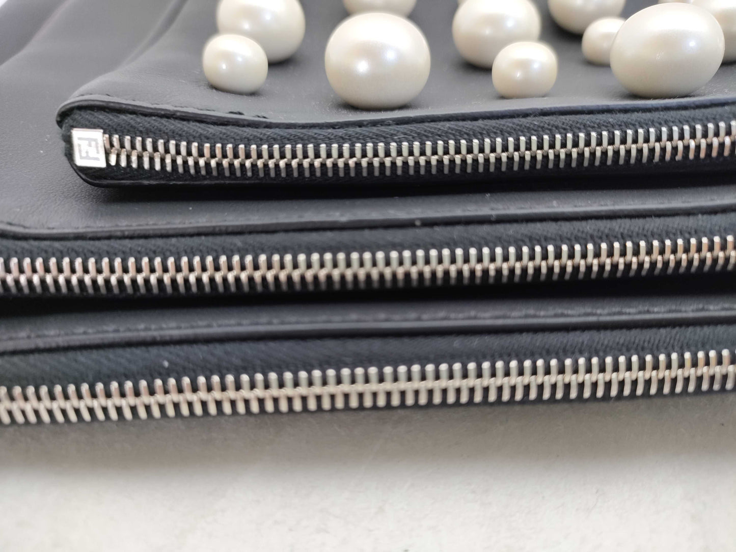 FENDI Triplet Leather Clutch Bag in Black with Faux Pearls